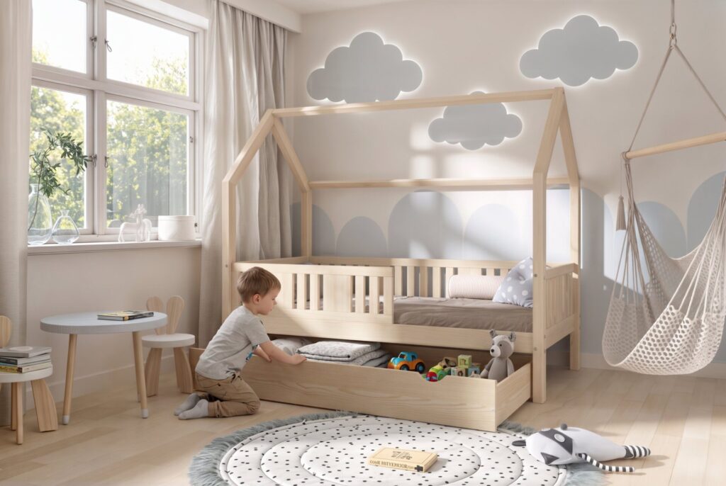 Child in the STELLIA Children’s Bed with Drawer
